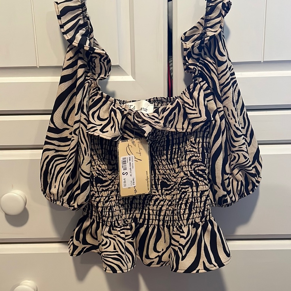 Size small new with tags zebra smock ruffle top